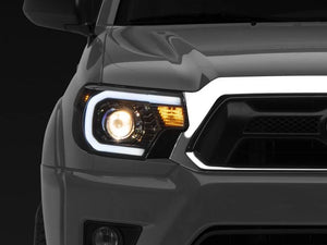 Raxiom Axial Series Projector Headlights with LED Bar; Black Housing; Clear Lens (12-15 Tacoma) Item TT21849
