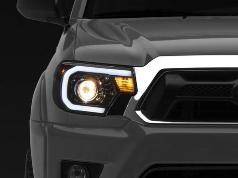 Raxiom Axial Series Projector Headlights with LED Bar; Black Housing; Clear Lens (12-15 Tacoma) Item TT21849